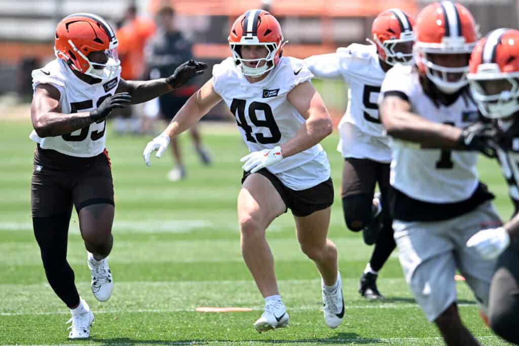 BEREA, OHIO - JUNE 11: Carson Schwesinger #49 of the Cleveland Browns runs a drill during Cleveland Browns mandatory minicamp at CrossCountry Mortgage Campus on June 11, 2025 in Berea, Ohio.