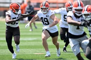 BEREA, OHIO - JUNE 11: Carson Schwesinger #49 of the Cleveland Browns runs a drill during Cleveland Browns mandatory minicamp at CrossCountry Mortgage Campus on June 11, 2025 in Berea, Ohio.