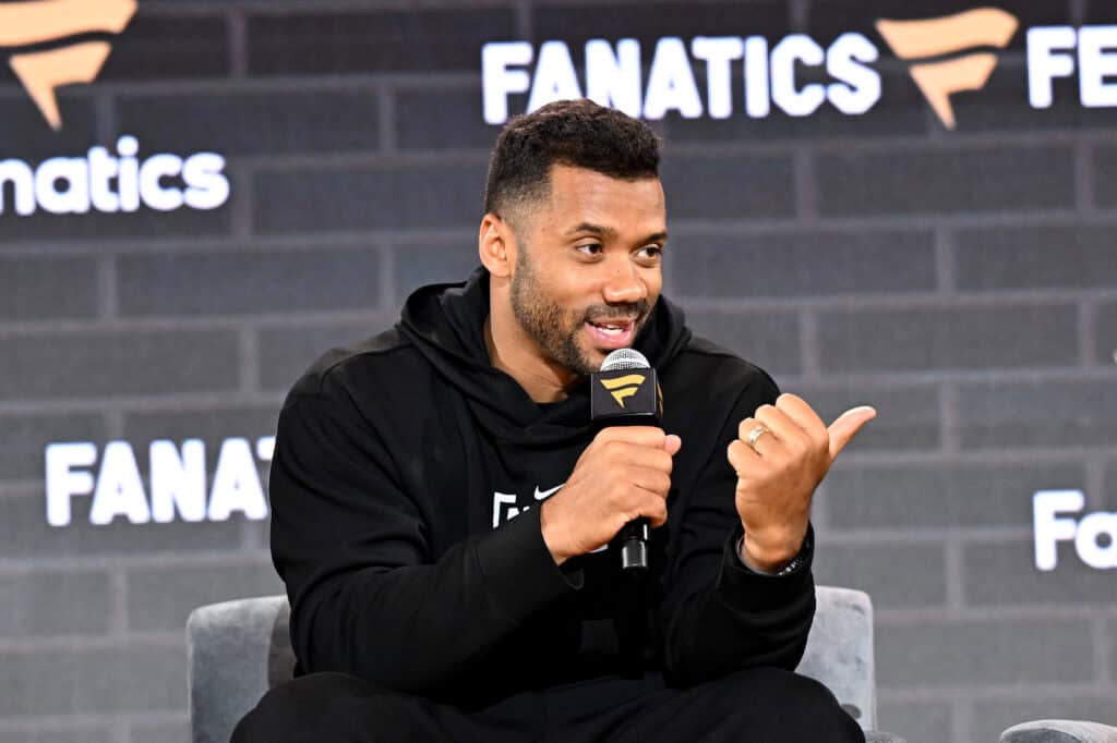 NEW YORK, NEW YORK - JUNE 20: Russell Wilson speaks onstage at Fanatics Fest NYC 2025 at Javits Center on June 20, 2025 in New York City.