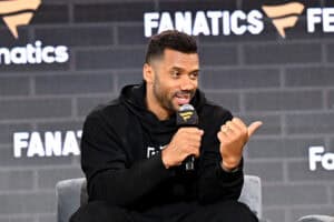 NEW YORK, NEW YORK - JUNE 20: Russell Wilson speaks onstage at Fanatics Fest NYC 2025 at Javits Center on June 20, 2025 in New York City.