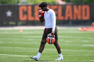 BEREA, OHIO - JUNE 04: Shedeur Sanders #12 of the Cleveland Browns walks off the field after Cleveland Browns OTA offseason workouts at CrossCountry Mortgage Campus on June 04, 2025 in Berea, Ohio.