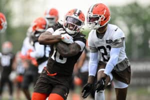 BEREA, OHIO - JUNE 04: Quinshon Judkins #10 and Denzel Ward #21 of the Cleveland Browns run a drill during Cleveland Browns OTA offseason workouts at CrossCountry Mortgage Campus on June 04, 2025 in Berea, Ohio.