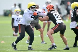 BEREA, OHIO - JULY 25: Defensive end Adin Huntington #66 and tight end Blake Whiteheart #86 of the Cleveland Browns run a play during training camp at CrossCountry Mortgage Campus on July 25, 2025 in Berea, Ohio.