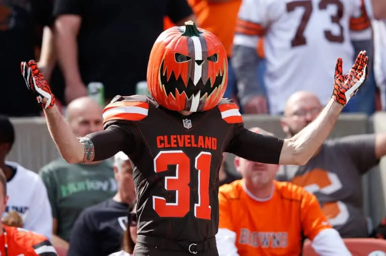 CLEVELAND, OH - SEPTEMBER 27: A Cleveland Browns fan cheers during the first quarter against the Oakland Raiders at FirstEnergy Stadium on September 27, 2015 in Cleveland, Ohio.