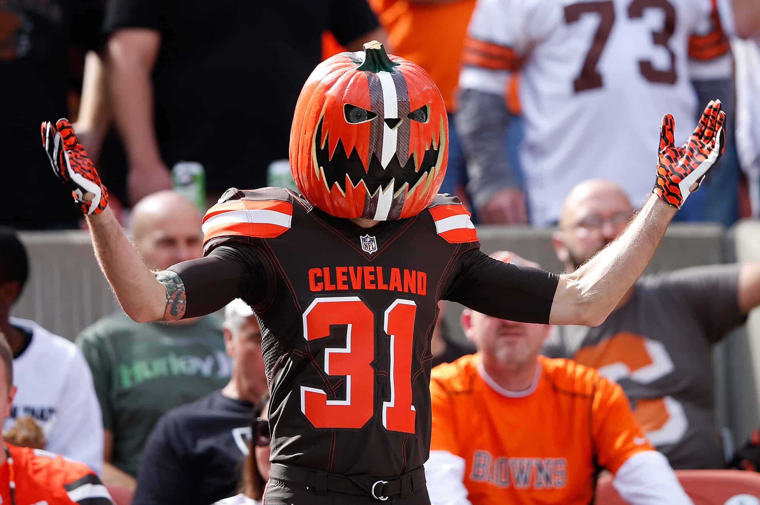 CLEVELAND, OH - SEPTEMBER 27: A Cleveland Browns fan cheers during the first quarter against the Oakland Raiders at FirstEnergy Stadium on September 27, 2015 in Cleveland, Ohio.