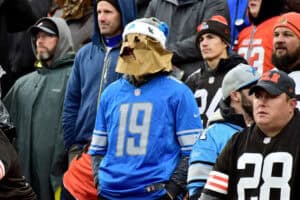 CLEVELAND, OHIO - NOVEMBER 21: A fan of the Detroit Lions wears a paper bag over his head during the game between the Detroit Lions and the Cleveland Browns at FirstEnergy Stadium on November 21, 2021 in Cleveland, Ohio.