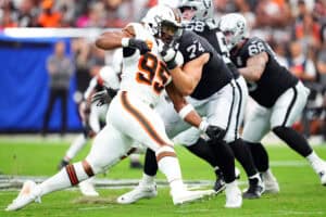 LAS VEGAS, NEVADA - SEPTEMBER 29: Myles Garrett #95 of the Cleveland Browns rushes against Kolton Miller #74 of the Las Vegas Raiders in the second quarter at Allegiant Stadium on September 29, 2024 in Las Vegas, Nevada.