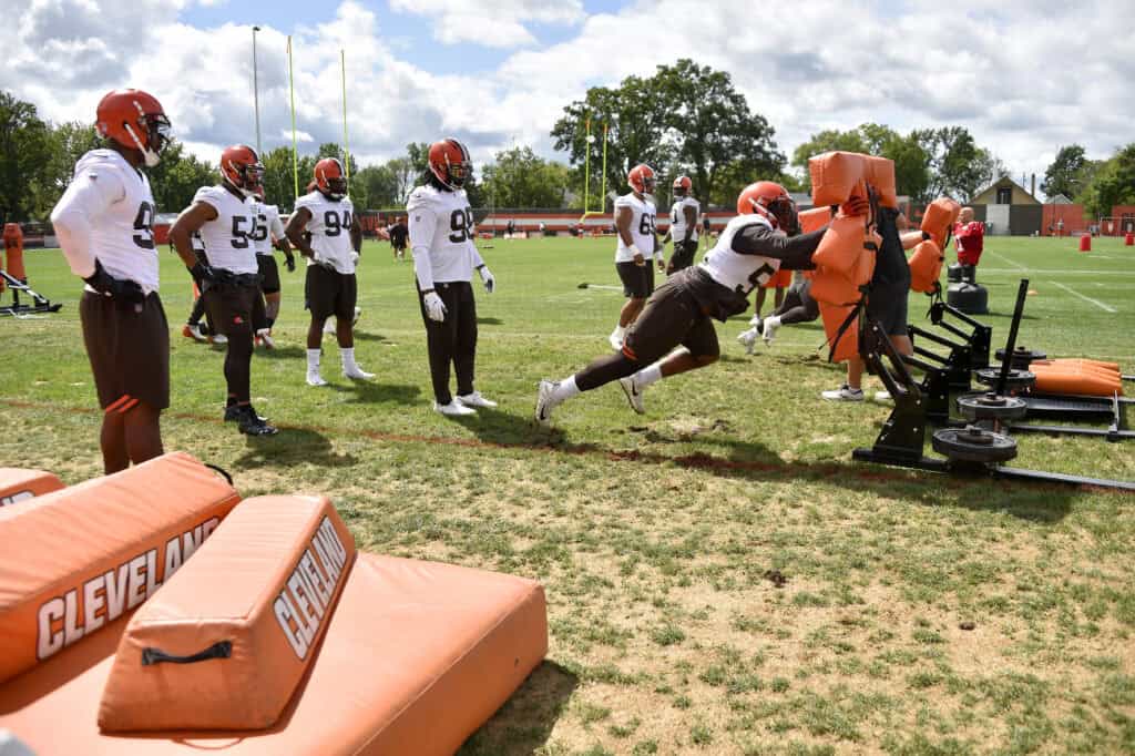BEREA, OHIO - AUGUST 29: Defensive end Myles Garrett #95 of the Cleveland Browns works out alongside other members of the defensive line during training camp at the Browns training facility on August 29, 2020 in Berea, Ohio.