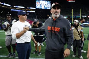 SEATTLE, WASHINGTON - AUGUST 24: Head coach Kevin Stefanski of the Cleveland Browns shakes hands with head coach Mike Macdonald of the Seattle Seahawks after an NFL preseason game at Lumen Field on August 24, 2024 in Seattle, Washington.