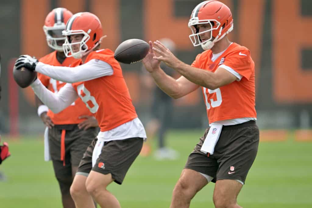 BEREA, OHIO - JUNE 12: Quarterbacks Shedeur Sanders #12 Kenny Pickett #8 and Joe Flacco #15 of the Cleveland Browns run a drill during organized team activities at CrossCountry Mortgage Campus on June 12, 2025, in Berea, Ohio.