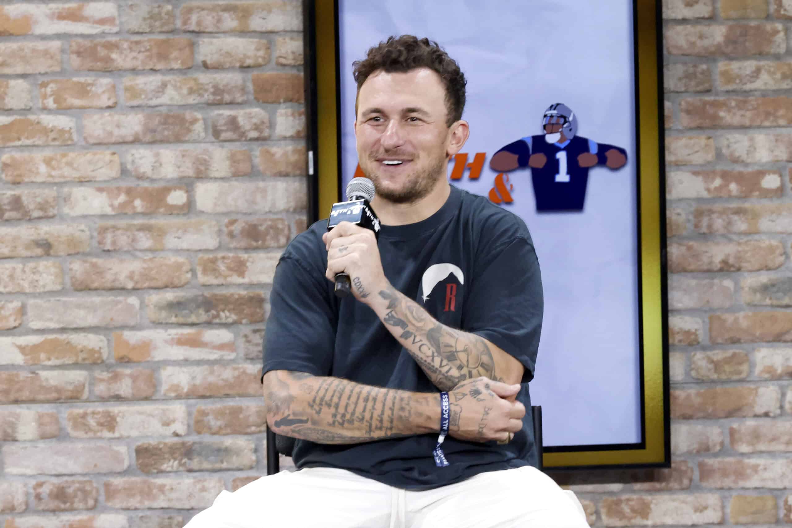 NEW YORK, NEW YORK - AUGUST 16: Johnny Manziel speaks onstage at the Fanatics Fest NYC 2024 at Jacob Javits Center on August 16, 2024 in New York City.