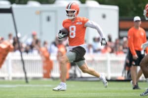 BEREA, OHIO - JULY 25: Quarterback Kenny Pickett #8 of the Cleveland Browns scrambles during training camp at CrossCountry Mortgage Campus on July 25, 2025 in Berea, Ohio.