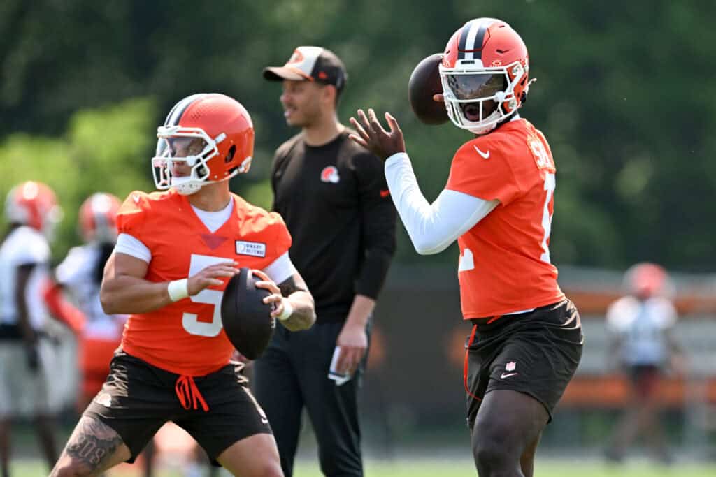 BEREA, OHIO - JUNE 11: Shedeur Sanders #12 and Dillon Gabriel #5 of the Cleveland Browns throw passes during Cleveland Browns mandatory minicamp at CrossCountry Mortgage Campus on June 11, 2025 in Berea, Ohio.