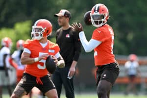 BEREA, OHIO - JUNE 11: Shedeur Sanders #12 and Dillon Gabriel #5 of the Cleveland Browns throw passes during Cleveland Browns mandatory minicamp at CrossCountry Mortgage Campus on June 11, 2025 in Berea, Ohio.