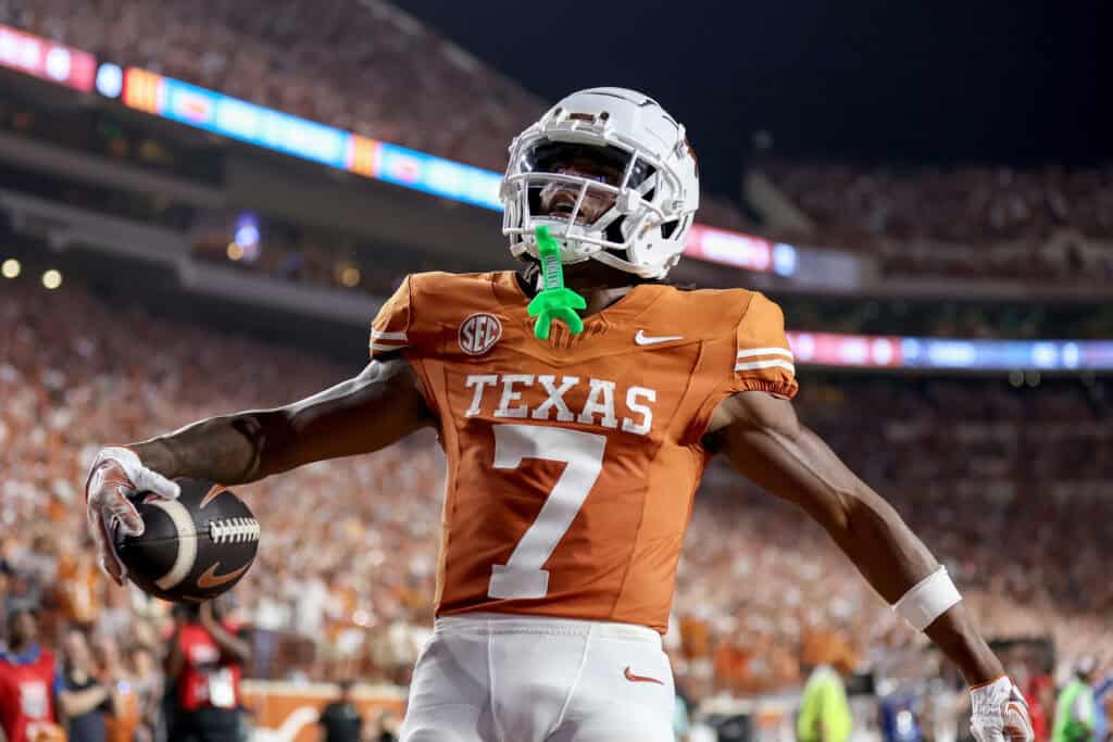 AUSTIN, TEXAS - SEPTEMBER 14: Isaiah Bond #7 of the Texas Longhorns reacts after a touchdown reception in the second half against the UTSA Roadrunners at Darrell K Royal-Texas Memorial Stadium on September 14, 2024 in Austin, Texas.
