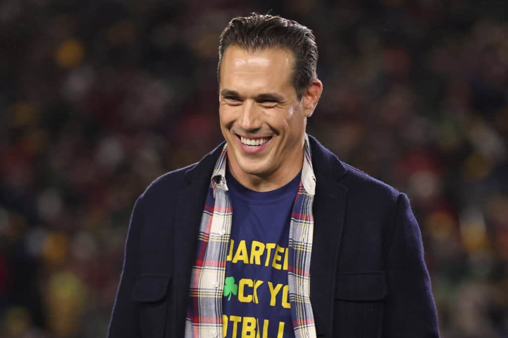 SOUTH BEND, INDIANA - DECEMBER 20: Former Notre Dame Fighting Irish quarterback Brady Quinn looks on in the Playoff First Round game against the Indiana Hoosiers at Notre Dame Stadium on December 20, 2024 in South Bend, Indiana.