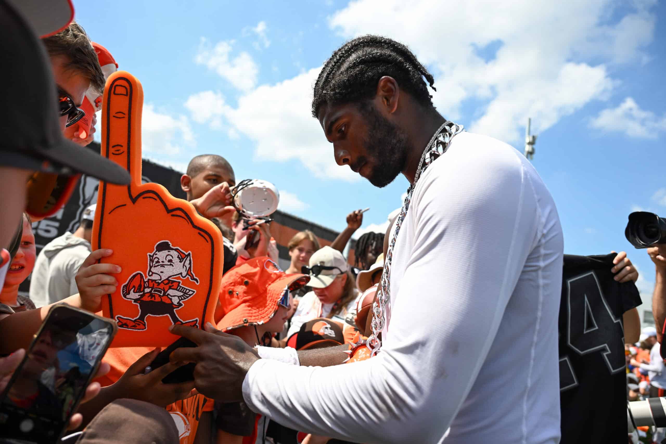 BEREA, OHIO - JULY 28: Shedeur Sanders #12 of the Cleveland Browns signs autographs after Cleveland Browns training camp at CrossCountry Mortgage Campus on July 28, 2025 in Berea, Ohio.