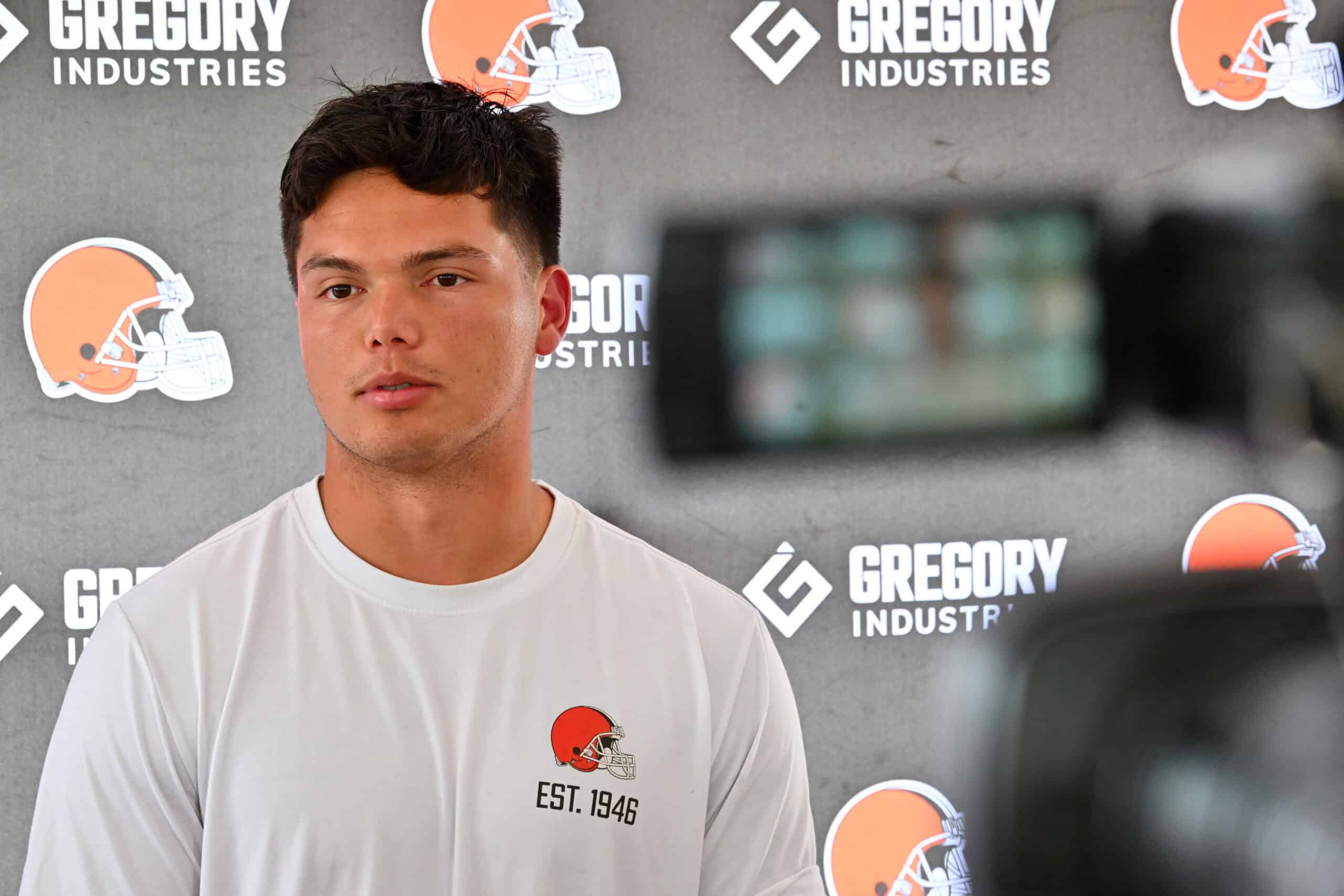 BEREA, OHIO - JULY 25: Quarterback Dillon Gabriel #5 of the Cleveland Browns talks to reporters during training camp at CrossCountry Mortgage Campus on July 25, 2025 in Berea, Ohio.