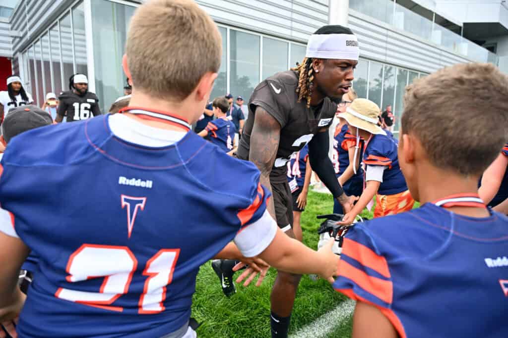 BEREA, OHIO - JULY 25: Wide receiver Jerry Jeudy #3 of the Cleveland Browns celebrates with fans during training camp at CrossCountry Mortgage Campus on July 25, 2025 in Berea, Ohio.