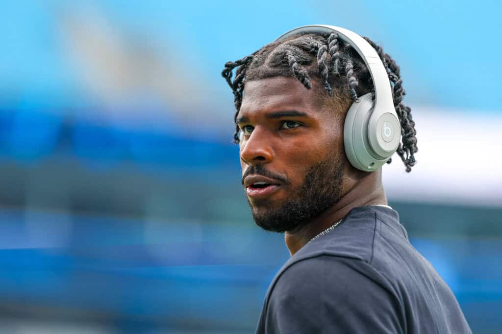 CHARLOTTE, NORTH CAROLINA - AUGUST 08: Shedeur Sanders #12 of the Cleveland Browns warms up before an NFL Preseason 2025 game against the Carolina Panthers at Bank of America Stadium on August 08, 2025 in Charlotte, North Carolina.
