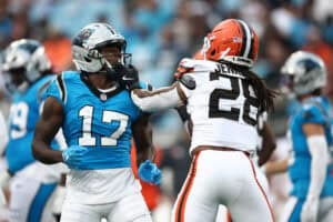 CHARLOTTE, NORTH CAROLINA - AUGUST 08: Wide receiver Xavier Legette #17 of the Carolina Panthers and safety Rayshawn Jenkins #28 of the Cleveland Browns have an altercation in the first half during the NFL Preseason 2025 game at Bank of America Stadium on August 08, 2025 in Charlotte, North Carolina.