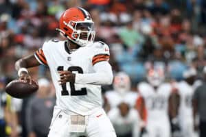 CHARLOTTE, NORTH CAROLINA - AUGUST 08: Quarterback Shedeur Sanders #12 of the Cleveland Browns drops to pass in the first half during the NFL Preseason 2025 game against the Carolina Panthers at Bank of America Stadium on August 08, 2025 in Charlotte, North Carolina.