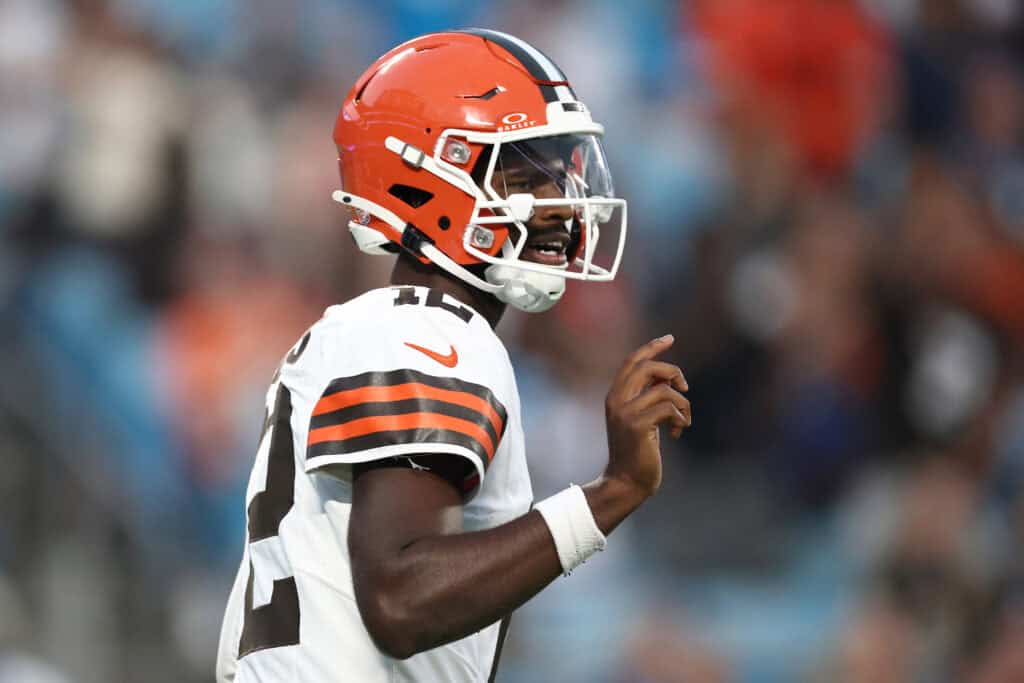 CHARLOTTE, NORTH CAROLINA - AUGUST 08: Quarterback Shedeur Sanders #12 of the Cleveland Browns reacts following a completion in the first half during the NFL Preseason 2025 game against the Carolina Panthers at Bank of America Stadium on August 08, 2025 in Charlotte, North Carolina.