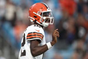 CHARLOTTE, NORTH CAROLINA - AUGUST 08: Quarterback Shedeur Sanders #12 of the Cleveland Browns reacts following a completion in the first half during the NFL Preseason 2025 game against the Carolina Panthers at Bank of America Stadium on August 08, 2025 in Charlotte, North Carolina.