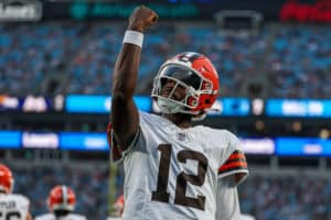 CHARLOTTE, NORTH CAROLINA - AUGUST 08: Shedeur Sanders #12 of the Cleveland Browns reacts after a touchdown during the 1st half of an NFL Preseason 2025 game against the Carolina Panthers at Bank of America Stadium on August 08, 2025 in Charlotte, North Carolina.