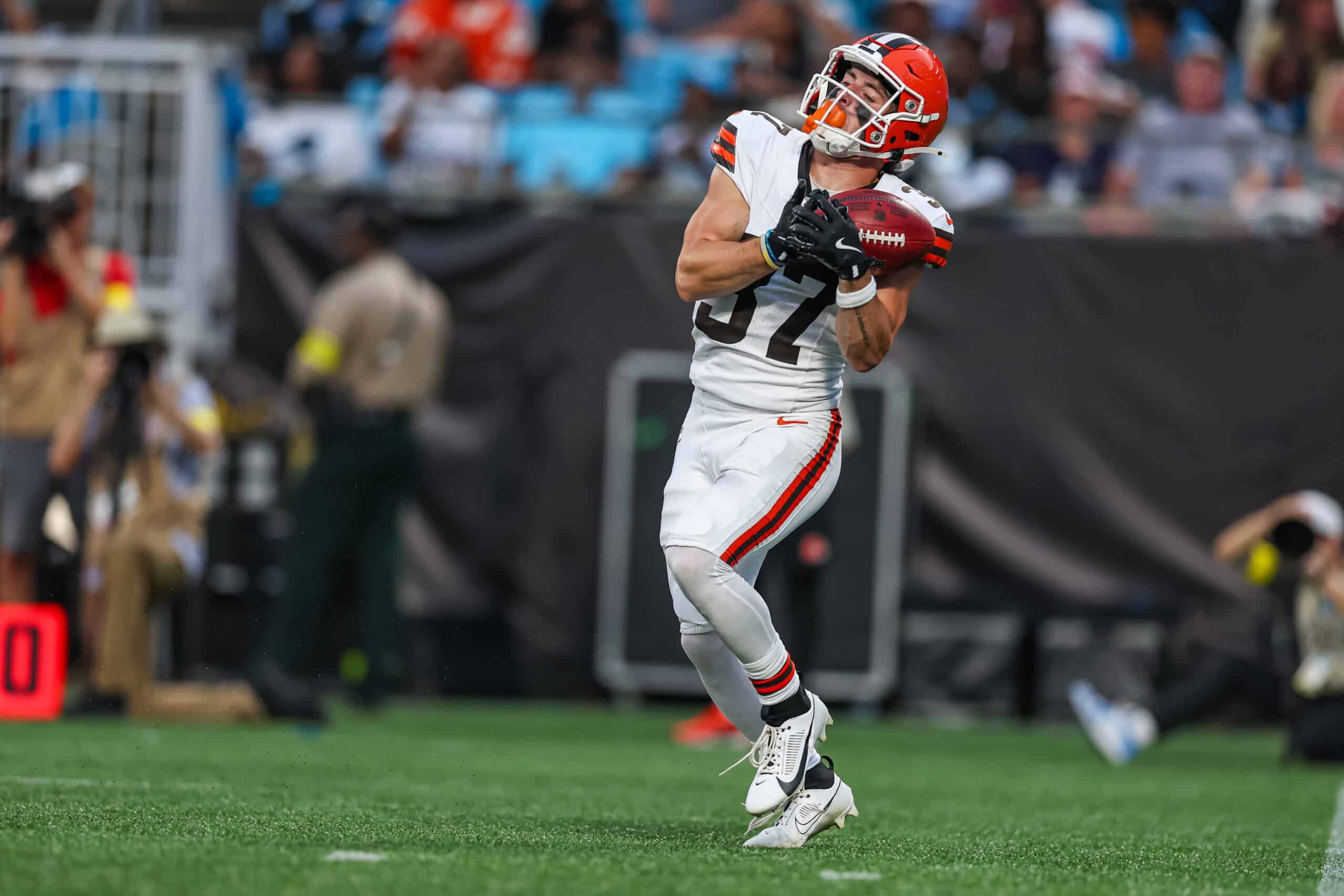 HARLOTTE, NORTH CAROLINA - AUGUST 08: Luke Floriea #37 of the Cleveland Browns returns a punt during the first half of an NFL Preseason 2025 game against the Carolina Panthers at Bank of America Stadium on August 08, 2025 in Charlotte, North Carolina.