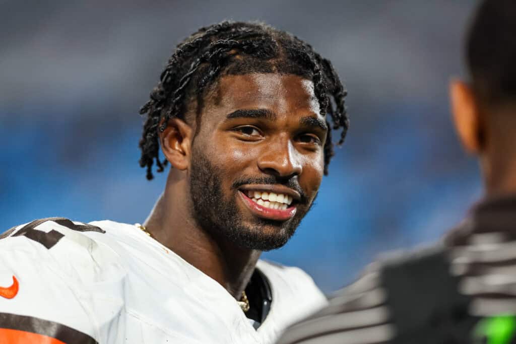 CHARLOTTE, NORTH CAROLINA - AUGUST 08: Shedeur Sanders #12 of the Cleveland Browns looks on during the second half of an NFL Preseason 2025 game against the Carolina Panthers at Bank of America Stadium on August 08, 2025 in Charlotte, North Carolina.