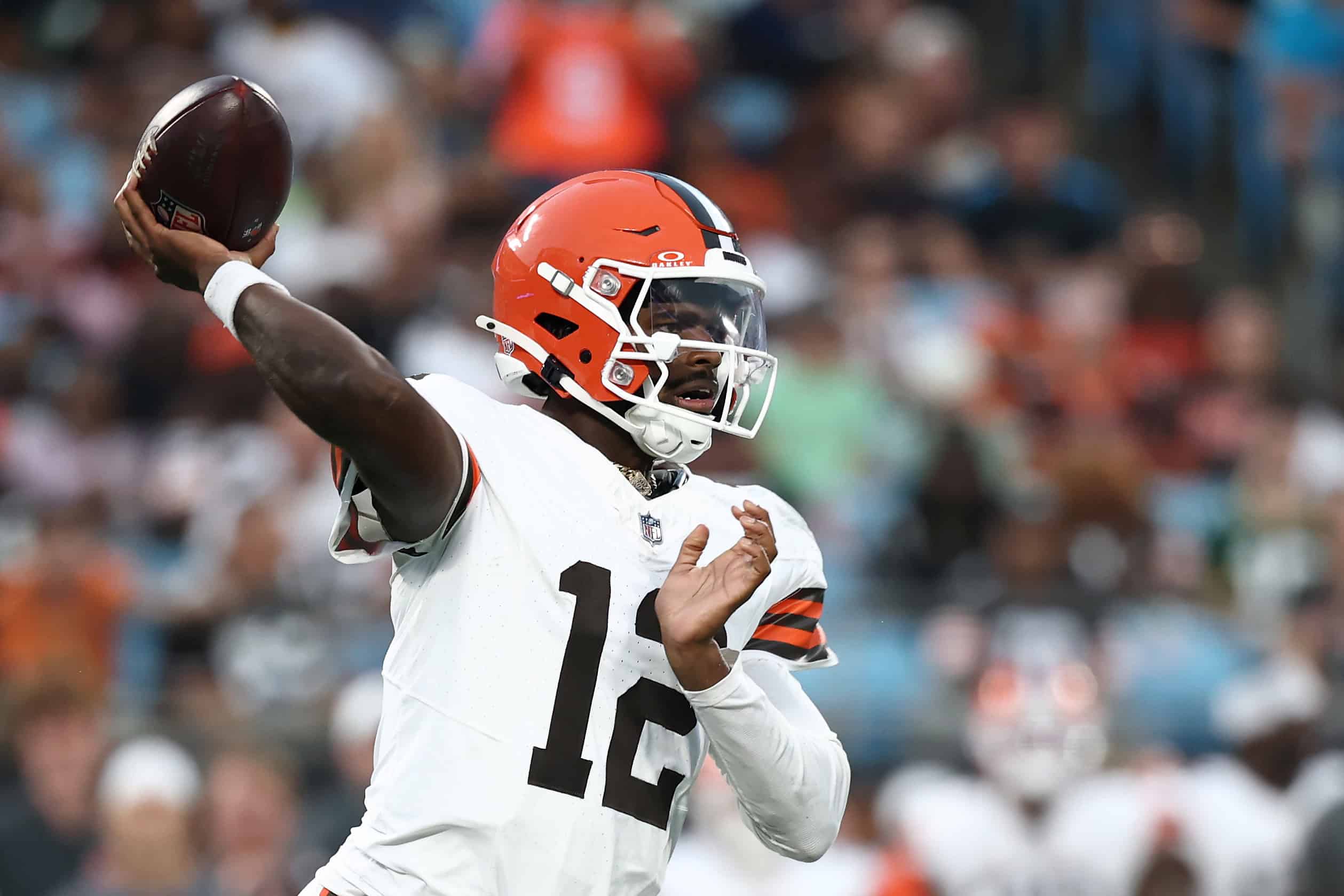 CHARLOTTE, NORTH CAROLINA - AUGUST 08: Quarterback Shedeur Sanders #12 of the Cleveland Browns drops to pass in the first half during the NFL Preseason 2025 game against the Carolina Panthers at Bank of America Stadium on August 08, 2025 in Charlotte, North Carolina.