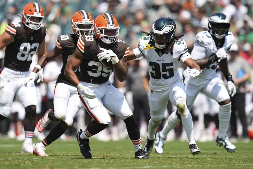 PHILADELPHIA, PENNSYLVANIA - AUGUST 16: Ahmani Marshall #39 of the Cleveland Browns runs the ball against Brandon Johnson #35 of the Philadelphia Eagles in the first half of the NFL Preseason 2025 game at Lincoln Financial Field on August 16, 2025 in Philadelphia, Pennsylvania. The Cleveland Browns defeated the Philadelphia Eagles 22-13.