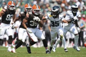 PHILADELPHIA, PENNSYLVANIA - AUGUST 16: Ahmani Marshall #39 of the Cleveland Browns runs the ball against Brandon Johnson #35 of the Philadelphia Eagles in the first half of the NFL Preseason 2025 game at Lincoln Financial Field on August 16, 2025 in Philadelphia, Pennsylvania. The Cleveland Browns defeated the Philadelphia Eagles 22-13.