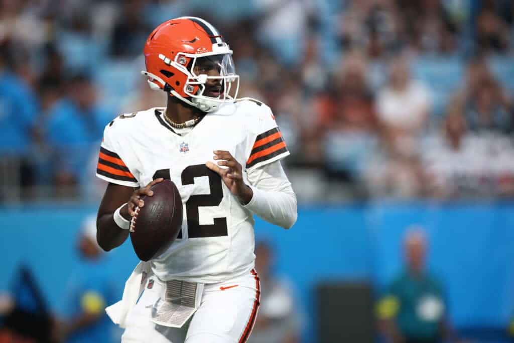 CHARLOTTE, NORTH CAROLINA - AUGUST 08: Quarterback Shedeur Sanders #12 of the Cleveland Browns drops to pass in the first half during the NFL Preseason 2025 game against the Carolina Panthers at Bank of America Stadium on August 08, 2025 in Charlotte, North Carolina.