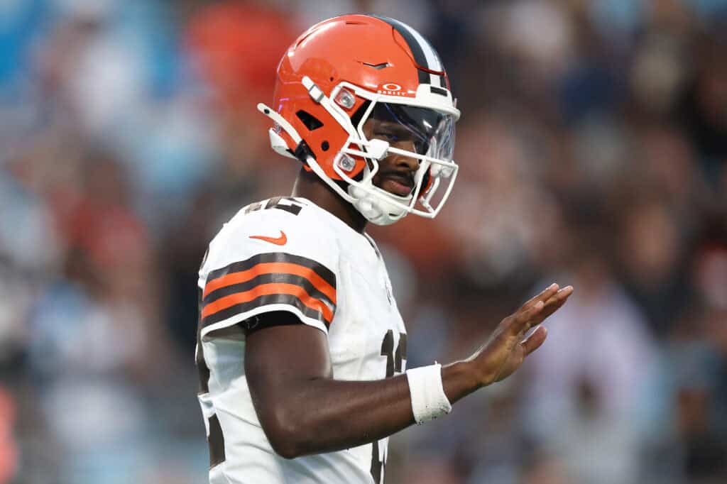 CHARLOTTE, NORTH CAROLINA - AUGUST 08: Quarterback Shedeur Sanders #12 of the Cleveland Browns reacts following a completion in the first half during the NFL Preseason 2025 game against the Carolina Panthers at Bank of America Stadium on August 08, 2025 in Charlotte, North Carolina.