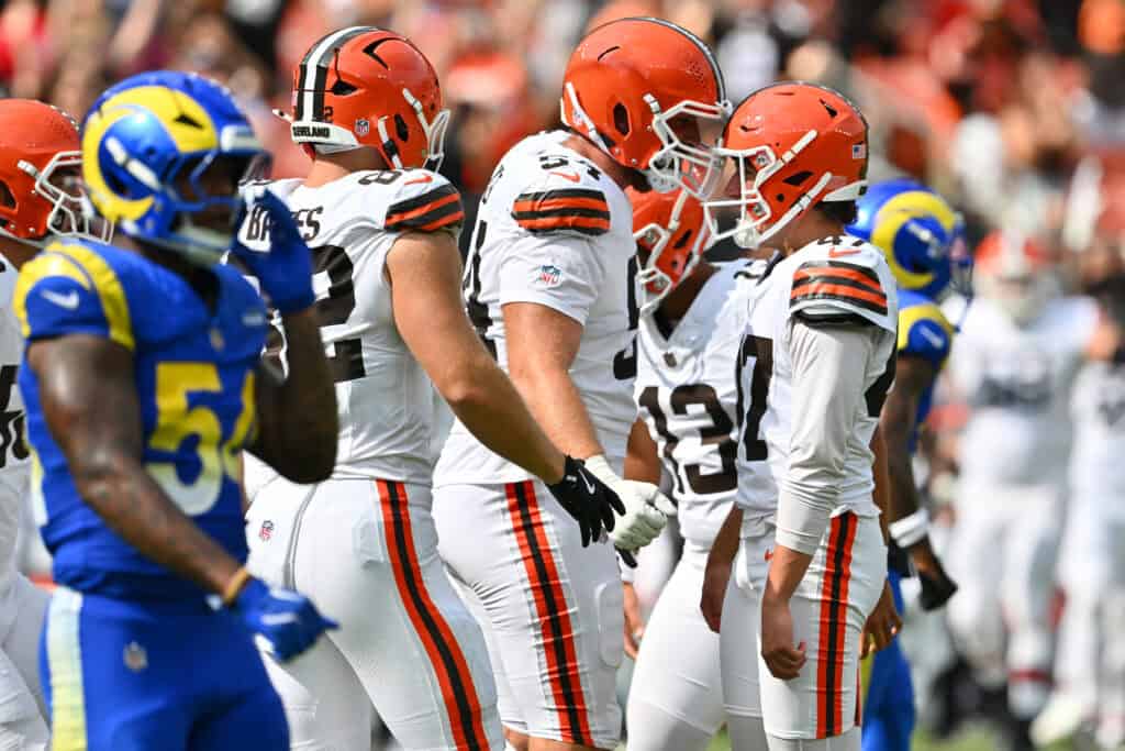 CLEVELAND, OHIO - AUGUST 23: Offensive tackle Kilian Zierer #54 celebrates with place kicker Andre Szmyt #47 of the Cleveland Browns after Szmyt kicked the game winning field goal in the last seconds of an NFL Preseason 2025 game against the Los Angeles Rams at Huntington Bank Field on August 23, 2025 in Cleveland, Ohio. The Browns defeated the Rams 19-17.