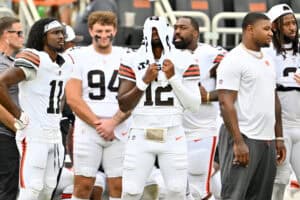 CLEVELAND, OHIO - AUGUST 23: Quarterback Shedeur Sanders #12 of the Cleveland Browns reacts after leaving the game during the fourth quarter of an NFL Preseason 2025 game against the Los Angeles Rams at Huntington Bank Field on August 23, 2025 in Cleveland, Ohio. The Browns defeated the Rams 19-17.
