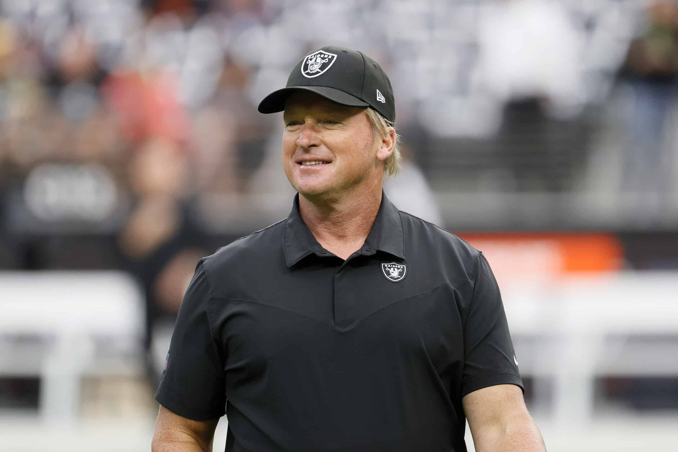LAS VEGAS, NEVADA - OCTOBER 10: Head coach John Gruden of the Las Vegas Raiders looks on before a game against the Chicago Bears at Allegiant Stadium on October 10, 2021 in Las Vegas, Nevada.