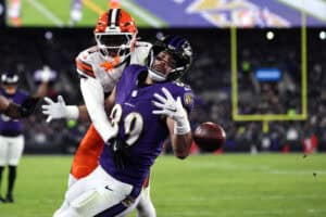 BALTIMORE, MARYLAND - JANUARY 04: Juan Thornhill #1 of the Cleveland Browns breaks up a pass intended for Mark Andrews #89 of the Baltimore Ravens during the second quarter at M&T Bank Stadium on January 04, 2025 in Baltimore, Maryland.