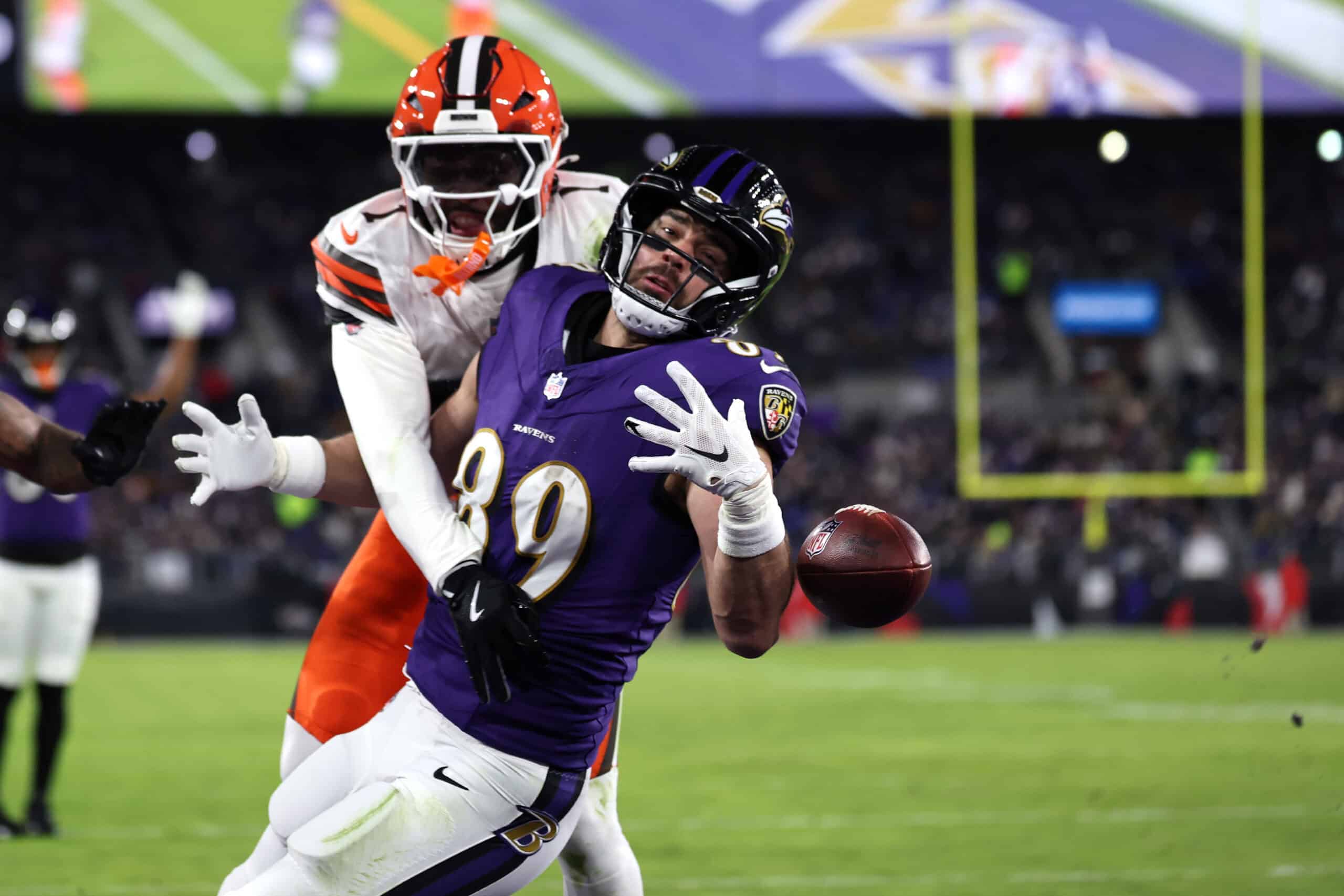 BALTIMORE, MARYLAND - JANUARY 04: Juan Thornhill #1 of the Cleveland Browns breaks up a pass intended for Mark Andrews #89 of the Baltimore Ravens during the second quarter at M&T Bank Stadium on January 04, 2025 in Baltimore, Maryland.