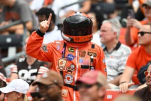 CLEVELAND, OHIO - AUGUST 23: A Cleveland Browns fan dressed as an astronaut poses for a photo during the first quarter of an NFL Preseason 2025 game against the Los Angeles Rams at Huntington Bank Field on August 23, 2025 in Cleveland, Ohio.