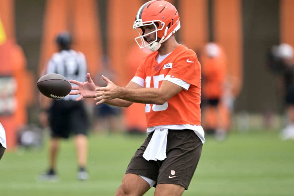 BEREA, OHIO - JULY 25: Quarterback Joe Flacco #15 of the Cleveland Browns catches a snap during training camp at CrossCountry Mortgage Campus on July 25, 2025 in Berea, Ohio.