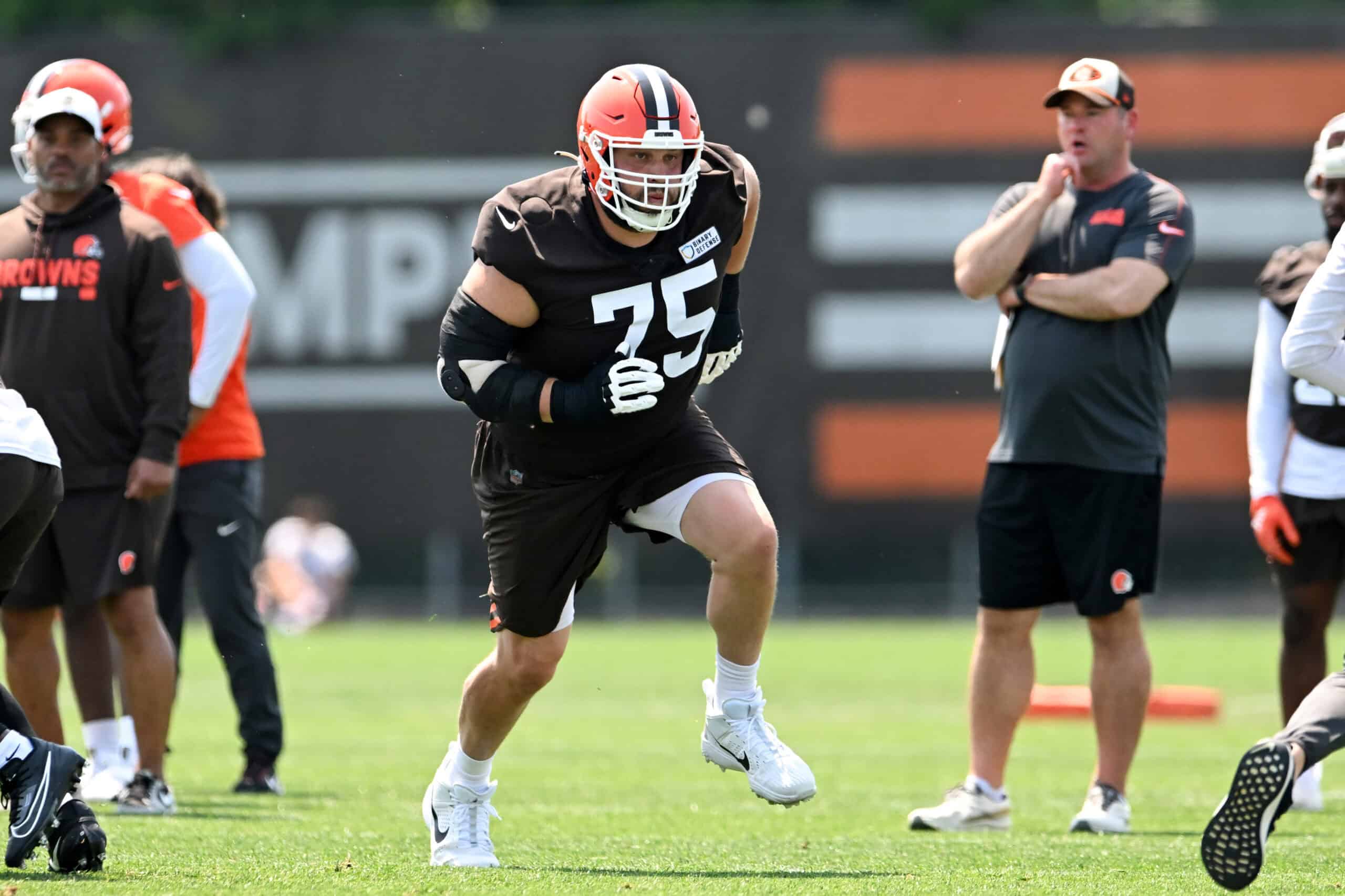 BEREA, OHIO - JUNE 11: Joel Bitonio #75 of the Cleveland Browns runs a drill during Cleveland Browns mandatory minicamp at CrossCountry Mortgage Campus on June 11, 2025 in Berea, Ohio.