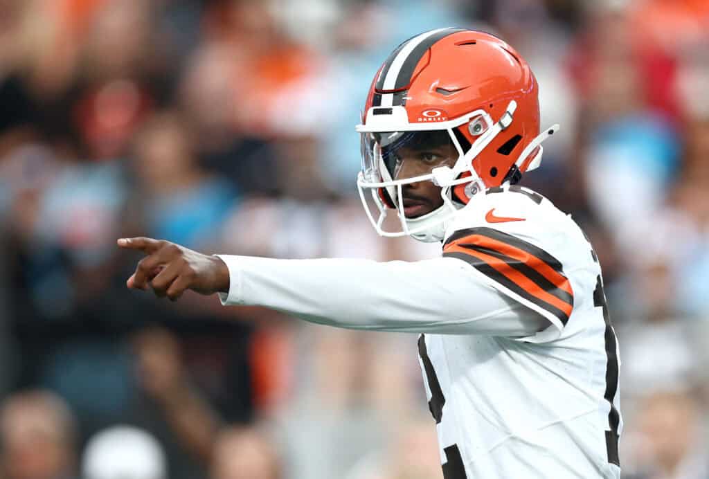 CHARLOTTE, NORTH CAROLINA - AUGUST 08: Quarterback Shedeur Sanders #12 of the Cleveland Browns reacts at the line of scrimmage in the first half during the NFL Preseason 2025 game against the Carolina Panthers at Bank of America Stadium on August 08, 2025 in Charlotte, North Carolina.