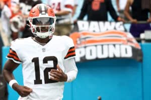 CHARLOTTE, NORTH CAROLINA - AUGUST 08: Quarterback Shedeur Sanders #12 of the Cleveland Browns walks out the tunnel prior to the NFL Preseason 2025 game against the Carolina Panthers at Bank of America Stadium on August 08, 2025 in Charlotte, North Carolina.
