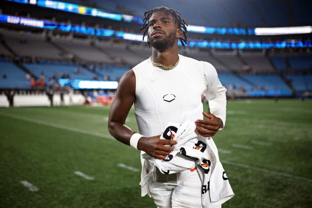 CHARLOTTE, NORTH CAROLINA - AUGUST 08: Quarterback Shedeur Sanders #12 of the Cleveland Browns runs off the field following their victory over the Carolina Panthers in the NFL Preseason 2025 game at Bank of America Stadium on August 08, 2025 in Charlotte, North Carolina.