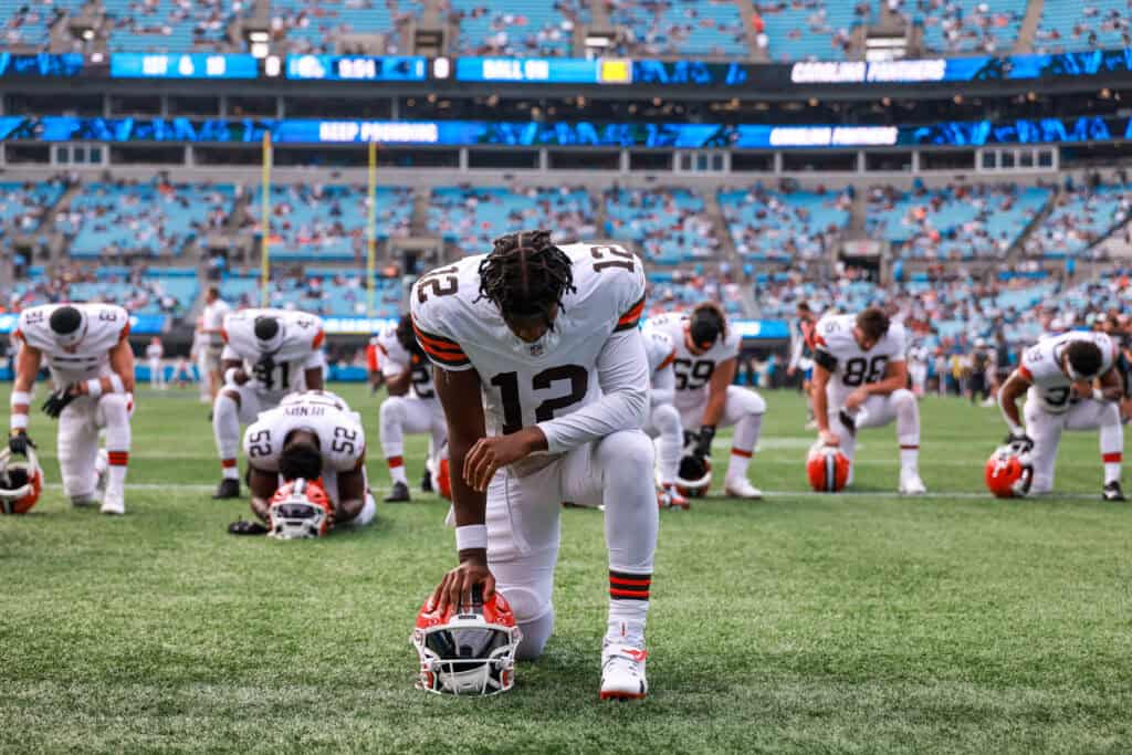 CHARLOTTE, NORTH CAROLINA - AUGUST 08: Shedeur Sanders #12 of the Cleveland Browns prays before an NFL Preseason 2025 game against the Carolina Panthers at Bank of America Stadium on August 08, 2025 in Charlotte, North Carolina.