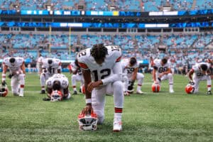 CHARLOTTE, NORTH CAROLINA - AUGUST 08: Shedeur Sanders #12 of the Cleveland Browns prays before an NFL Preseason 2025 game against the Carolina Panthers at Bank of America Stadium on August 08, 2025 in Charlotte, North Carolina.