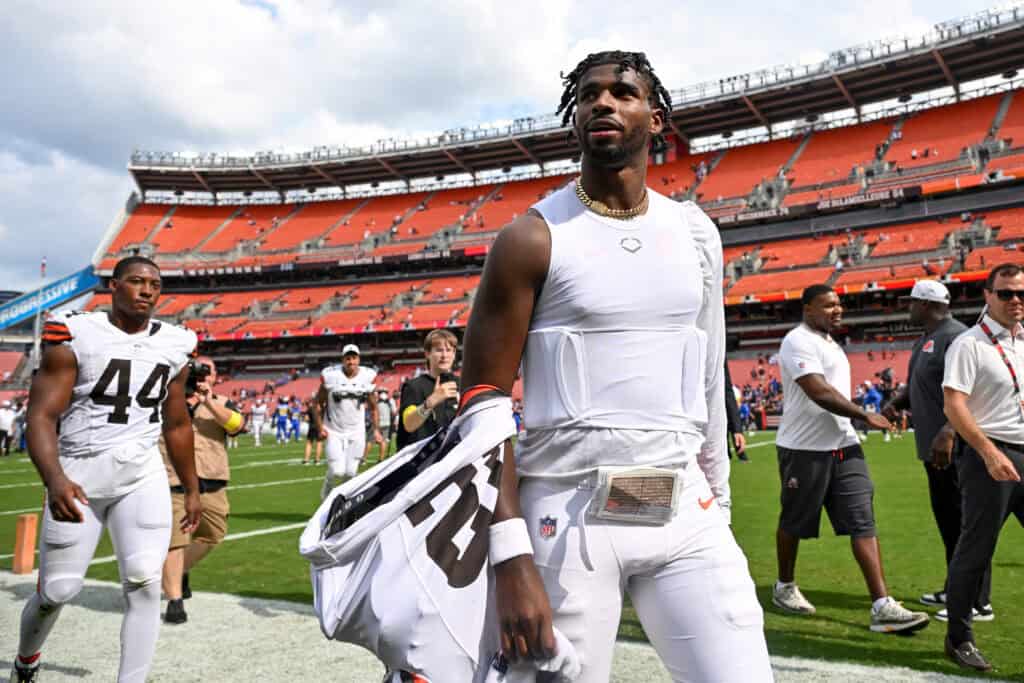 CLEVELAND, OHIO - AUGUST 23: Shedeur Sanders #12 of the Cleveland Browns walks off the field after the team's 17-16 win over the Los Angeles Rams in an NFL Preseason 2025 game at Huntington Bank Field on August 23, 2025 in Cleveland, Ohio.
